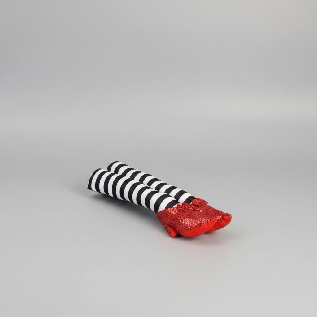 Halloween door stopper featuring whimsical witch legs with a striped design, perfect for festive indoor and outdoor decor. 0